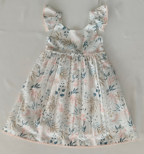 Charmante robe blanche pour enfants avec imprimé feuilles rose clair et détails en dentelle