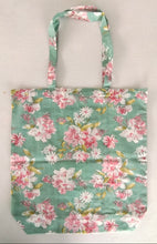 Sac fourre-tout réversible à fleurs et rayures vertes avec poche avant supplémentaire, facile à transporter, tissu en coton.